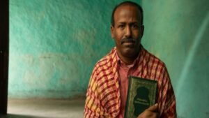 Aweis Ali, cristão somali e sobrevivente de perseguição religiosa, representando a resiliência da igreja na Somália.