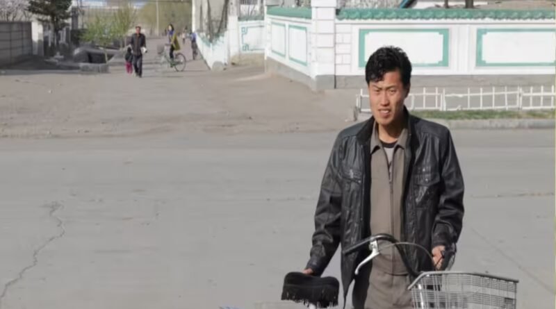 Cristão Jang retornando para sua família após ser solto da prisão na Coreia do Norte.